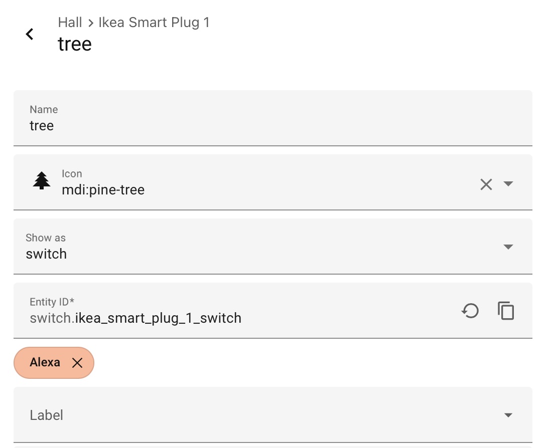 Home Assistant entity details screen showing an IKEA smart plug named 'tree' with the Alexa label applied in the Labels section